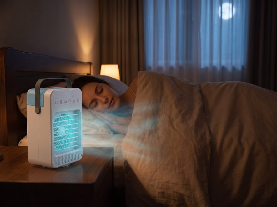 CoolJet AC in use — misting breeze at a desk